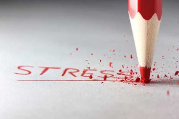 red pencil writing the word stress